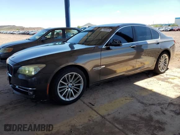 2013 BMW 7 Series 750i with VIN WBAYA8C50DD227660, listed as a Copart auction lot 71820475 with 120,533 mi miles and Salvage title. Bid and sale history available at DreamBid. Image 1.
