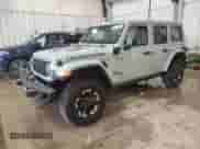 2024 Jeep Wrangler Rubicon with VIN 1C4RJXR66RW100859, listed as a Copart auction lot 58377805 with 9,426 mi miles and Salvage title. Bid and sale history available at DreamBid. Image 1.