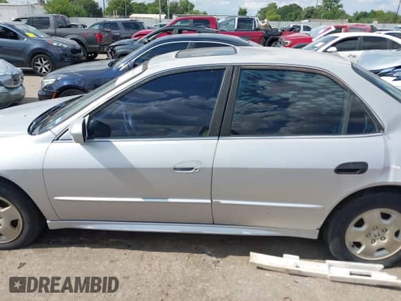 2002 Honda Accord EX with VIN 1HGCG16572A054301, listed as a IAAI auction lot 42986815 with 212,723 mi miles and . Bid and sale history available at DreamBid. Image 14.