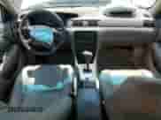 1997 Toyota Camry LE z VIN JT2BF22K5V0027518, wystawiony jako Copart lot #64042195 z przebiegiem 120 074 mil mil oraz Szkoda całkowita • Salvage title. Historia ofert i sprzedaży dostępna na DreamBid. Obrazek 8.