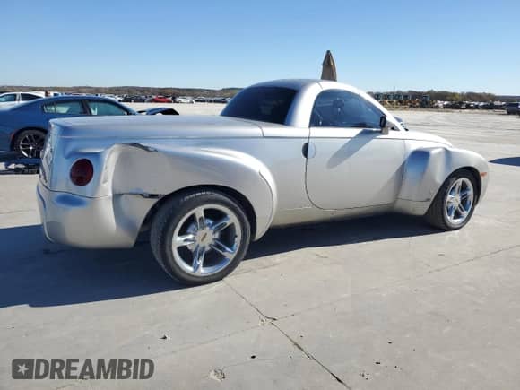 2005 Chevrolet SSR LS с VIN 1GCES14H75B114899, выставлен на аукционе Copart как лот 84464164 с пробегом 99 359 миль миль и Списание • Salvage title. История ставок и продаж доступна на DreamBid. Изображение 3.