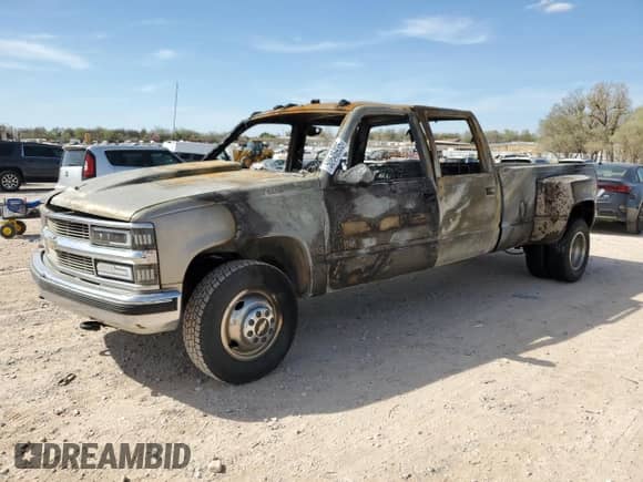 1999 Chevrolet Silverado 3500 с VIN 1GCHC33J2XF038028, выставлен на аукционе Copart как лот 50646935 с пробегом Не указан миль и На запчасти • Non repairable. История ставок и продаж доступна на DreamBid. Изображение 1.