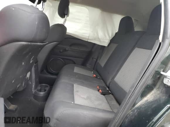 2010 Jeep Compass Sport z VIN 1J4NT1FB6AD626166, wystawiony jako Copart lot #88448045 z przebiegiem 181 098 mil mil oraz Szkoda całkowita • Salvage title. Historia ofert i sprzedaży dostępna na DreamBid. Obrazek 11.