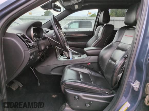 2019 Jeep Grand Cherokee Trailhawk with VIN 1C4RJFLG8KC697113, listed as a Copart auction lot 65579955 with 77,574 mi miles and Salvage title. Bid and sale history available at DreamBid. Image 7.