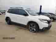 2020 Honda Passport Touring with VIN 5FNYF7H97LB000127, listed as a Copart auction lot 57613775 with 68,851 mi miles and Salvage title. Bid and sale history available at DreamBid. Image 4.