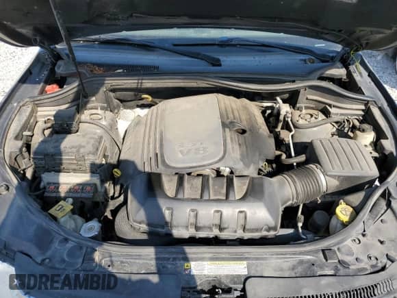 2011 Jeep Grand Cherokee 70th Anniversary z VIN 1J4RR4GT0BC632321, wystawiony jako Copart lot #66772334 z przebiegiem 203 708 mil mil oraz Szkoda całkowita • Salvage title. Historia ofert i sprzedaży dostępna na DreamBid. Obrazek 11.