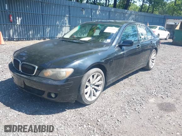 2007 BMW 7 Series 750i with VIN WBAHL83557DT08894, listed as a IAAI auction lot 42544687 with 122,529 mi miles and . Bid and sale history available at DreamBid. Image 2.