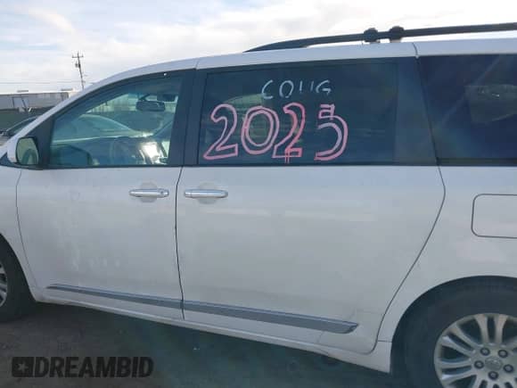 2013 Toyota Sienna XLE AAS with VIN 5TDYK3DC8DS324853, listed as a IAAI auction lot 41647704 with 143,656 mi miles and . Bid and sale history available at DreamBid. Image 14.