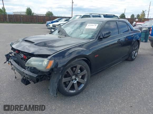2014 Chrysler 300 SRT-8 with VIN 2C3CCAFJ9EH171489, listed as a IAAI auction lot 43108178 with 122,509 mi miles and . Bid and sale history available at DreamBid. Image 17.