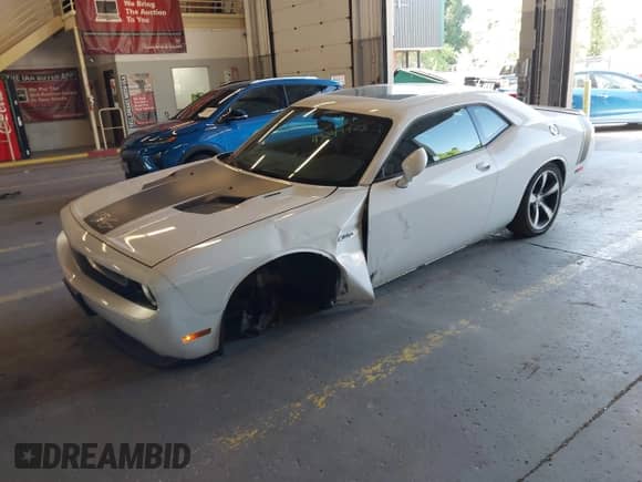 2014 Dodge Challenger R/T with VIN 2C3CDYBT6EH263740, listed as a IAAI auction lot 43049908 with 51,181 mi miles and . Bid and sale history available at DreamBid. Image 2.
