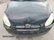 2008 Hyundai Accent GS z VIN KMHCM36C08U083661, wystawiony jako Copart lot #65689985 z przebiegiem 130 404 mil mil oraz Szkoda całkowita • Salvage title. Historia ofert i sprzedaży dostępna na DreamBid. Obrazek 11.