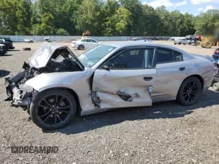 2016 Dodge Charger SXT with VIN 2C3CDXHG8GH210397, listed as a Copart auction lot 70907745 with 77,065 mi miles and Salvage title. Bid and sale history available at DreamBid. Image 1.