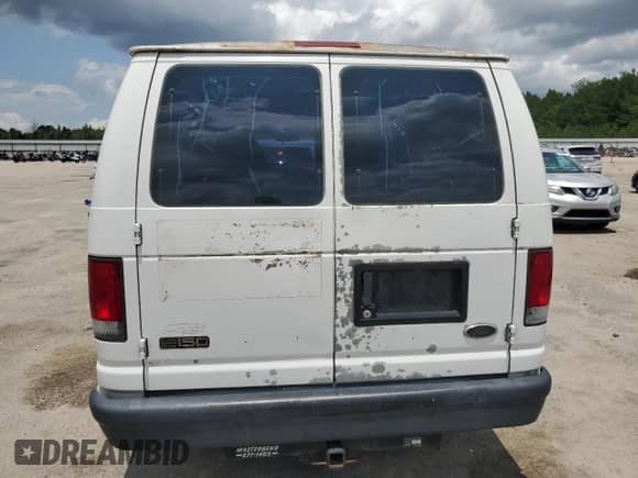 2000 Ford Econoline Cargo with VIN 1FTRE14W3YHA95843, listed as a Copart auction lot 59744325 with 234,748 mi miles and Salvage title. Bid and sale history available at DreamBid. Image 6.