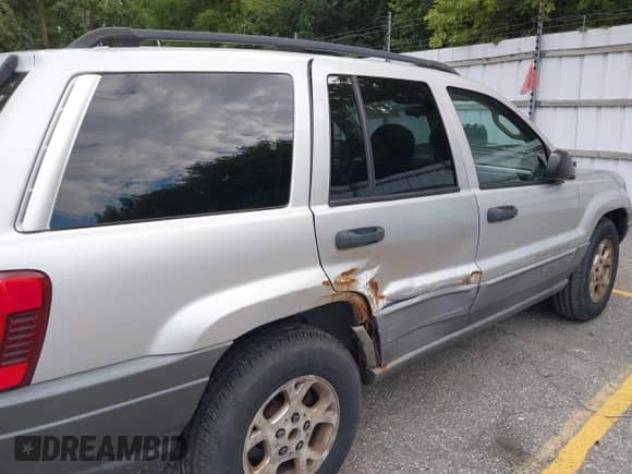 2002 Jeep Grand Cherokee с VIN 1J4GX38S92C237261, выставлен на аукционе IAAI как лот 42923904 с пробегом 112 640 миль миль и . История ставок и продаж доступна на DreamBid. Изображение 12.