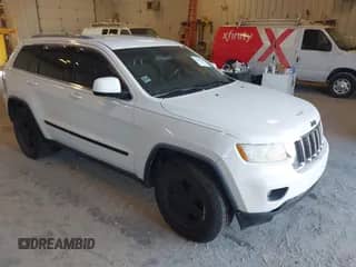 2012 Jeep Grand Cherokee Laredo with VIN 1C4RJFAG8CC141355, listed as a IAAI auction lot 43390830 with 173,259 mi miles and . Bid and sale history available at DreamBid. Image 1.