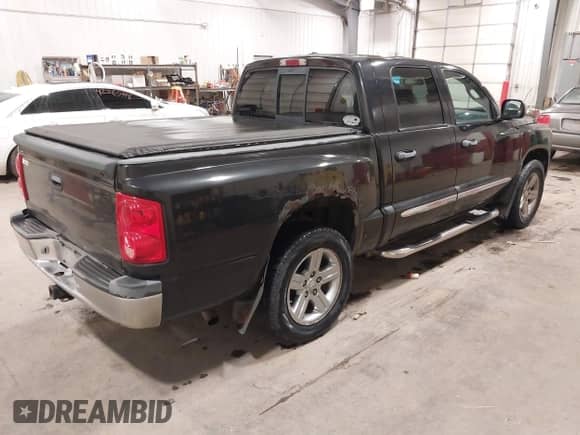 2008 Dodge Dakota Laramie with VIN 1D7HW58N38S534565, listed as a IAAI auction lot 42278869 with 155,327 mi miles and . Bid and sale history available at DreamBid. Image 4.