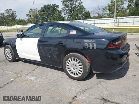 2021 Dodge Charger Police с VIN 2C3CDXKG0MH585284, выставлен на аукционе Copart как лот 84587855 с пробегом 86 157 миль миль и Списание • Salvage title. История ставок и продаж доступна на DreamBid. Изображение 2.