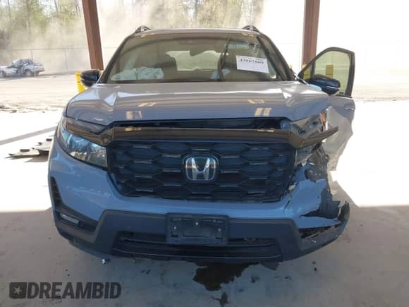 2022 Honda Passport Elite with VIN 5FNYF8H08NB019585, listed as a IAAI auction lot 42067809 with Not provided miles and . Bid and sale history available at DreamBid. Image 11.