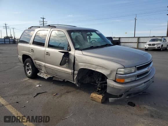 2001 Chevrolet Tahoe LT with VIN 1GNEK13T11J222092, listed as a Copart auction lot 70934935 with Not provided miles and Salvage title. Bid and sale history available at DreamBid. Image 4.