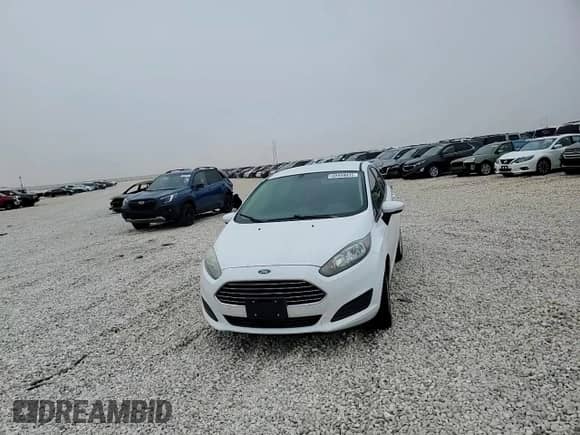2015 Ford Fiesta SE z VIN 3FADP4BJ5FM118020, wystawiony jako Copart lot #69458035 z przebiegiem 100 895 mil mil oraz Czysty tytuł • Clean title. Historia ofert i sprzedaży dostępna na DreamBid. Obrazek 13.