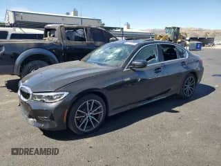 2019 BMW 3 Series 330i with VIN WBA5R1C53KAK10868, listed as a Copart auction lot 65270385 with 61,483 mi miles and Salvage title. Bid and sale history available at DreamBid. Image 1.