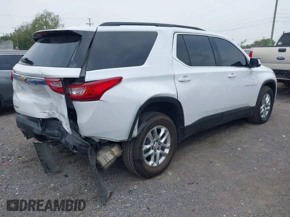 2021 Chevrolet Traverse LT z VIN 1GNERHKW4MJ233642, wystawiony jako IAAI lot #43240454 z przebiegiem 55 052 mil mil oraz . Historia ofert i sprzedaży dostępna na DreamBid. Obrazek 4.