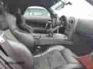 2003 Dodge Viper SRT-10 z VIN 1B3JR65Z73V501755, wystawiony jako Copart lot #76250344 z przebiegiem 43 826 mil mil oraz Nie do naprawy • Non repairable. Historia ofert i sprzedaży dostępna na DreamBid. Obrazek 10.
