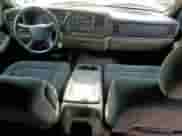 2002 Chevrolet Suburban LT с VIN 1GNEC16Z52J125301, выставлен на аукционе Copart как лот 69219085 с пробегом 272 829 миль миль и Списание • Salvage title. История ставок и продаж доступна на DreamBid. Изображение 8.