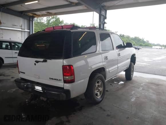 2002 Chevrolet Tahoe LT with VIN 1GNEC13Z92R235435, listed as a IAAI auction lot 42764198 with 248,194 mi miles and . Bid and sale history available at DreamBid. Image 4.