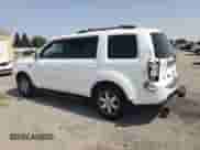 2010 Honda Pilot Touring with VIN 5FNYF4H86AB001871, listed as a Copart auction lot 70506155 with 133,582 mi miles and Salvage title. Bid and sale history available at DreamBid. Image 2.