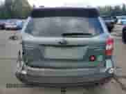 2015 Subaru Forester Touring with VIN JF2SJAWC5FH594724, listed as a Copart auction lot 84658235 with 72,361 mi miles and Salvage title. Bid and sale history available at DreamBid. Image 6.