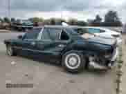 1998 BMW 7 Series 740iL with VIN WBAGJ8329WDM24296, listed as a Copart auction lot 73581634 with 247,498 mi miles and Salvage title. Bid and sale history available at DreamBid. Image 2.