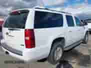 2010 Chevrolet Suburban LT z VIN 1GNUCJE05AR210539, wystawiony jako IAAI lot #41805107 z przebiegiem 166 305 mil mil oraz . Historia ofert i sprzedaży dostępna na DreamBid. Obrazek 6.