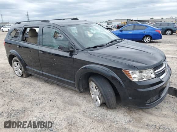 2012 Dodge Journey American Value с VIN 3C4PDCAB1CT169939, выставлен на аукционе Copart как лот 65083445 с пробегом 180 035 миль миль и Списание • Salvage title. История ставок и продаж доступна на DreamBid. Изображение 4.