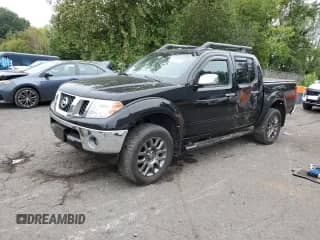 2010 Nissan Frontier LE with VIN 1N6AD0EV1AC422840, listed as a Copart auction lot 80325275 with 141,243 mi miles and Salvage title. Bid and sale history available at DreamBid. Image 1.