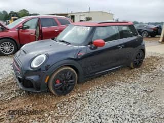 2023 MINI Hardtop John Cooper Works with VIN WMW73DH01P2T85209, listed as a Copart auction lot 56054275 with 15,545 mi miles and Salvage title. Bid and sale history available at DreamBid. Image 1.