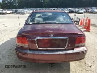 2003 Hyundai Sonata z VIN KMHWF25S73A716418, wystawiony jako Copart lot #72783504 z przebiegiem 118 206 mil mil oraz Szkoda całkowita • Salvage title. Historia ofert i sprzedaży dostępna na DreamBid. Obrazek 6.