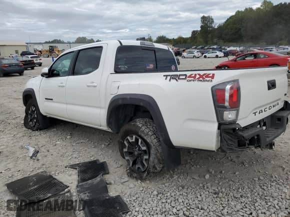 2022 Toyota Tacoma TRD Off Road with VIN 3TYCZ5AN4NT099666, listed as a Copart auction lot 85094295 with 45,880 mi miles and Salvage title. Bid and sale history available at DreamBid. Image 2.