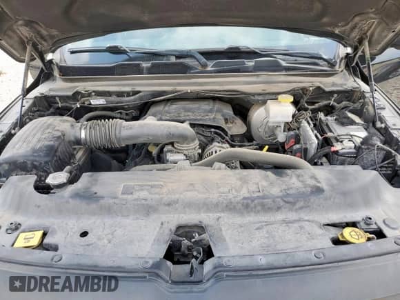 2020 Ram 1500 Rebel z VIN 1C6SRFLT6LN127034, wystawiony jako Copart lot #64791005 z przebiegiem 86 689 mil mil oraz Szkoda całkowita • Salvage title. Historia ofert i sprzedaży dostępna na DreamBid. Obrazek 11.