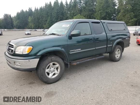 2001 Toyota Tundra Limited z VIN 5TBBT48171S143054, wystawiony jako Copart lot #71740305 z przebiegiem 121 330 mil mil oraz Czysty tytuł • Clean title. Historia ofert i sprzedaży dostępna na DreamBid. Obrazek 1.