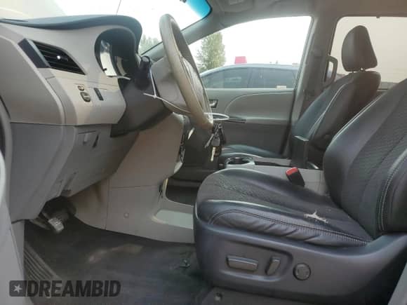 2011 Toyota Sienna SE with VIN 5TDXK3DC8BS106629, listed as a Copart auction lot 71554715 with 144,579 mi miles and Salvage title. Bid and sale history available at DreamBid. Image 7.