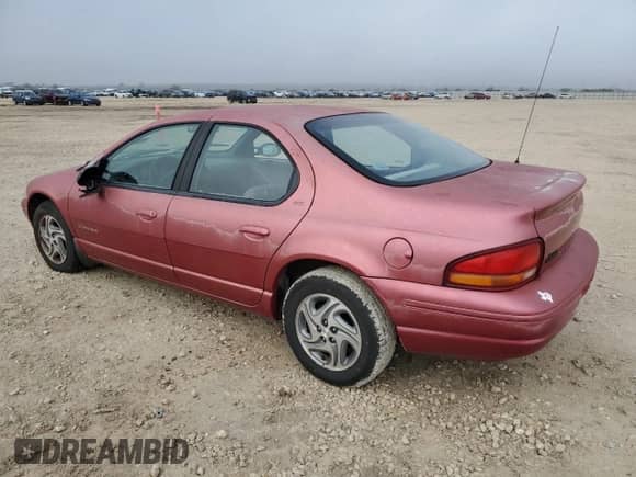 1998 Dodge Stratus ES with VIN 1B3EJ56H6WN168171, listed as a Copart auction lot 84886264 with 86,418 mi miles and Clean title. Bid and sale history available at DreamBid. Image 2.
