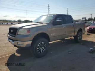 2004 Ford F-150 XLT with VIN 1FTPW14534KD17743, listed as a Copart auction lot 69704085 with 212,575 mi miles and Salvage title. Bid and sale history available at DreamBid. Image 1.