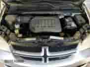 2012 Dodge Grand Caravan R/T z VIN 2C4RDGEG2CR100119, wystawiony jako Copart lot #60460245 z przebiegiem 231 222 mil mil oraz Szkoda całkowita • Salvage title. Historia ofert i sprzedaży dostępna na DreamBid. Obrazek 12.