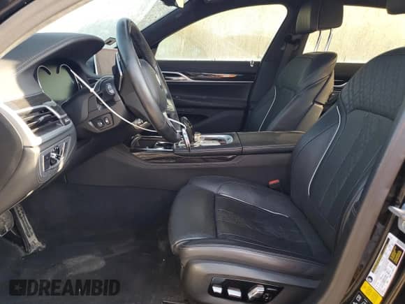 2019 BMW 7 Series 750i xDrive with VIN WBA7F2C53KB240017, listed as a Copart auction lot 65009774 with 11,175 mi miles and Salvage title. Bid and sale history available at DreamBid. Image 7.