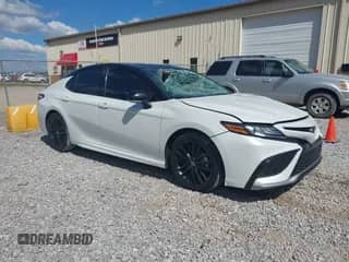2023 Toyota Camry XSE with VIN 4T1K61AK9PU092978, listed as a IAAI auction lot 43350073 with 69,151 mi miles and . Bid and sale history available at DreamBid. Image 1.