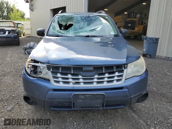 2011 Subaru Forester X z VIN JF2SHABC1BG711507, wystawiony jako Copart lot #64486475 z przebiegiem 173 037 mil mil oraz Szkoda całkowita • Salvage title. Historia ofert i sprzedaży dostępna na DreamBid. Obrazek 5.