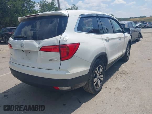 2017 Honda Pilot EX-L with VIN 5FNYF6H77HB017722, listed as a IAAI auction lot 42800151 with 94,457 mi miles and . Bid and sale history available at DreamBid. Image 4.