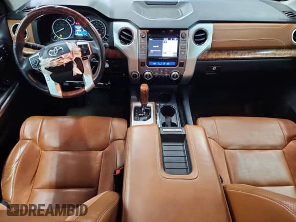 2017 Toyota Tundra Platinum with VIN 5TFAY5F1XHX635000, listed as a Copart auction lot 89438495 with 128,435 mi miles and Salvage title. Bid and sale history available at DreamBid. Image 8.