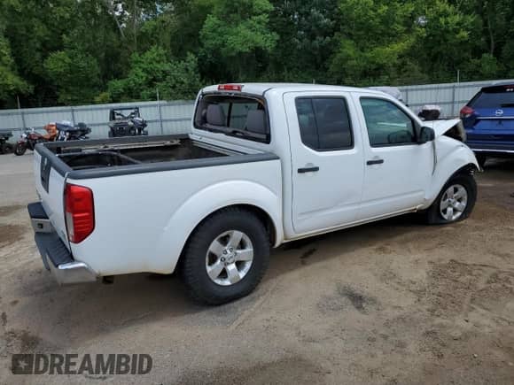 2010 Nissan Frontier SE with VIN 1N6AD0ER8AC433126, listed as a Copart auction lot 69820005 with Not provided miles and Salvage title. Bid and sale history available at DreamBid. Image 3.